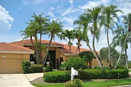 exterior of Florida home with palm trees